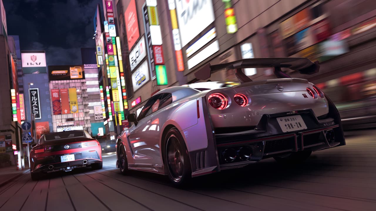 Forza Horizon 6 — Nissan GT-R NISMO and Nissan Z racing through a neon-lit Japanese city at night