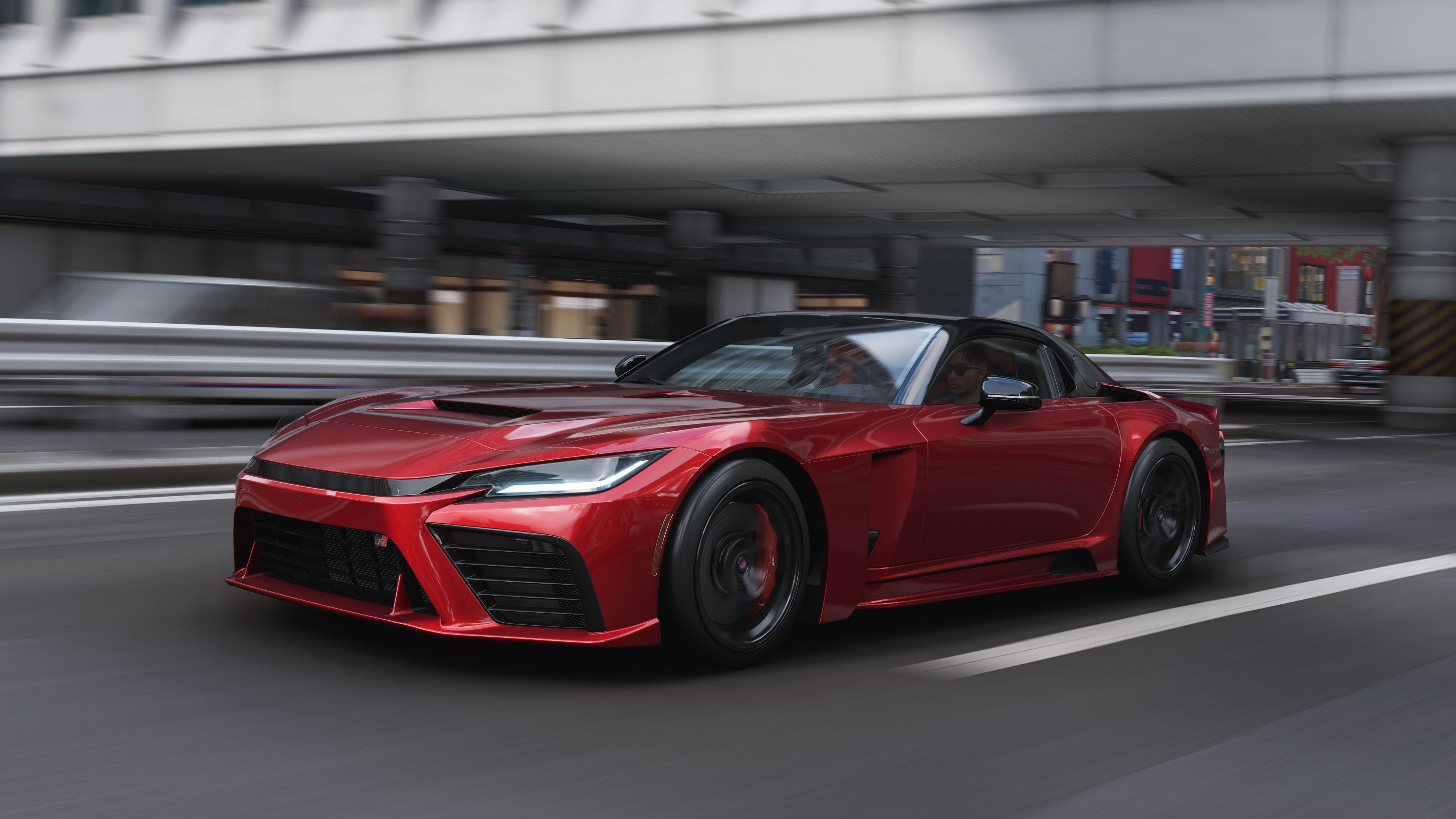 Forza Horizon 6 — red Toyota GR sports car speeding under a city overpass